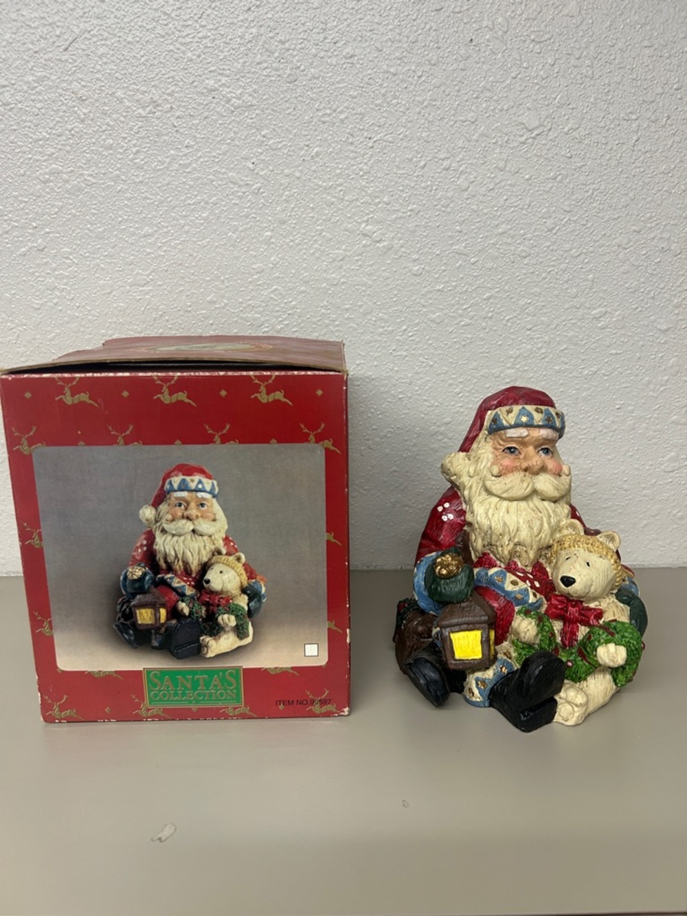 Vgt. Santa’s Collection Santa with dog figurine.